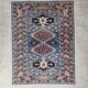 Vintage Kazak rug with geometric oriental motifs, 100% wool.