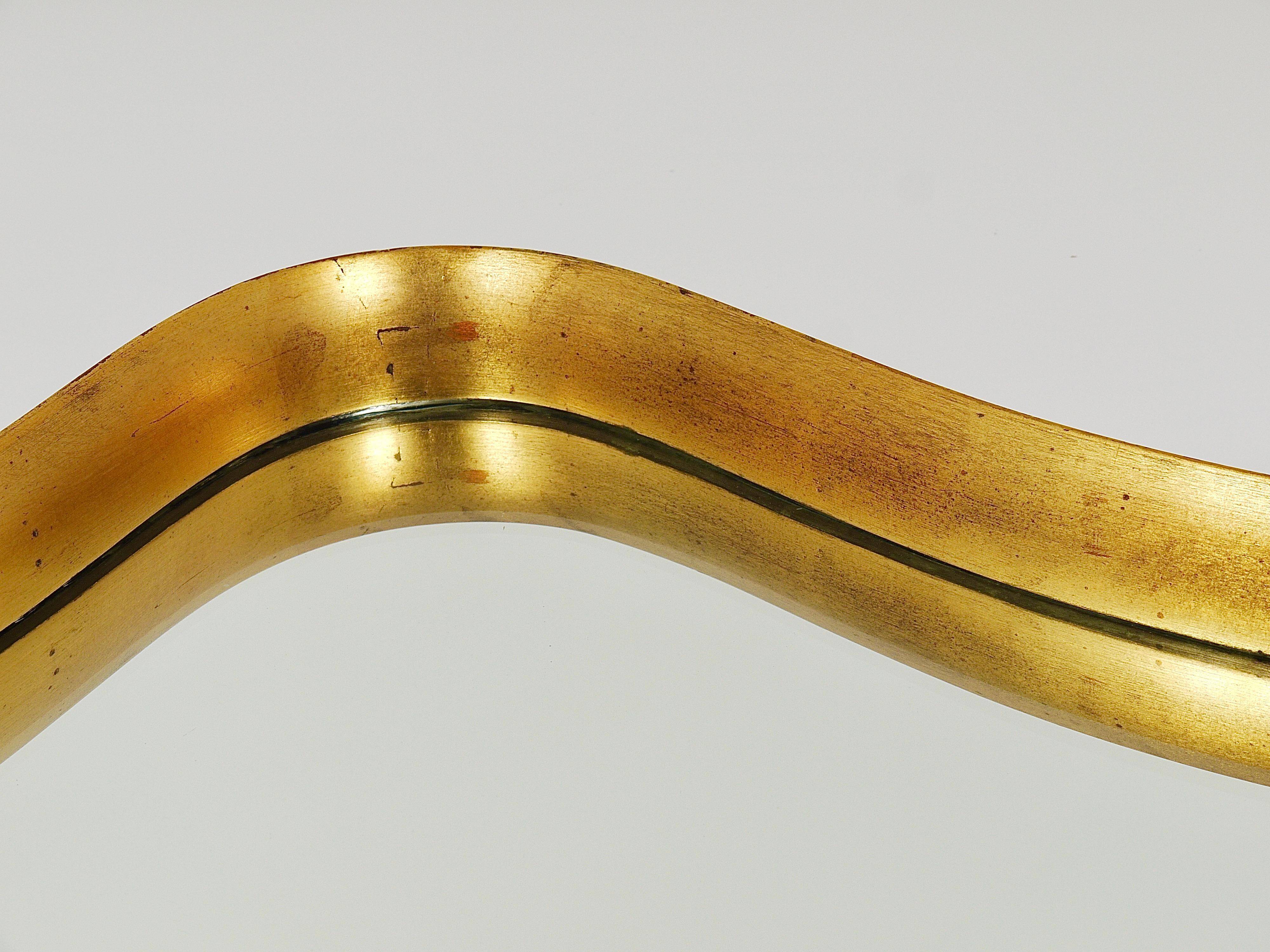 Golden wooden mirror in the style of Gio Ponti by Max Welz, Vienna, Austria, 1940s.