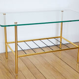 Glass coffee table with magazines holder