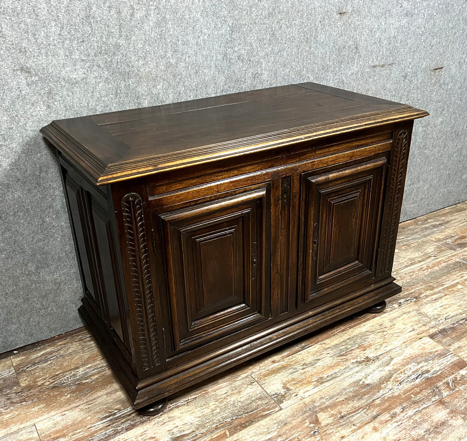 Sideboard has function as a Louis XIV period chest in solid walnut
