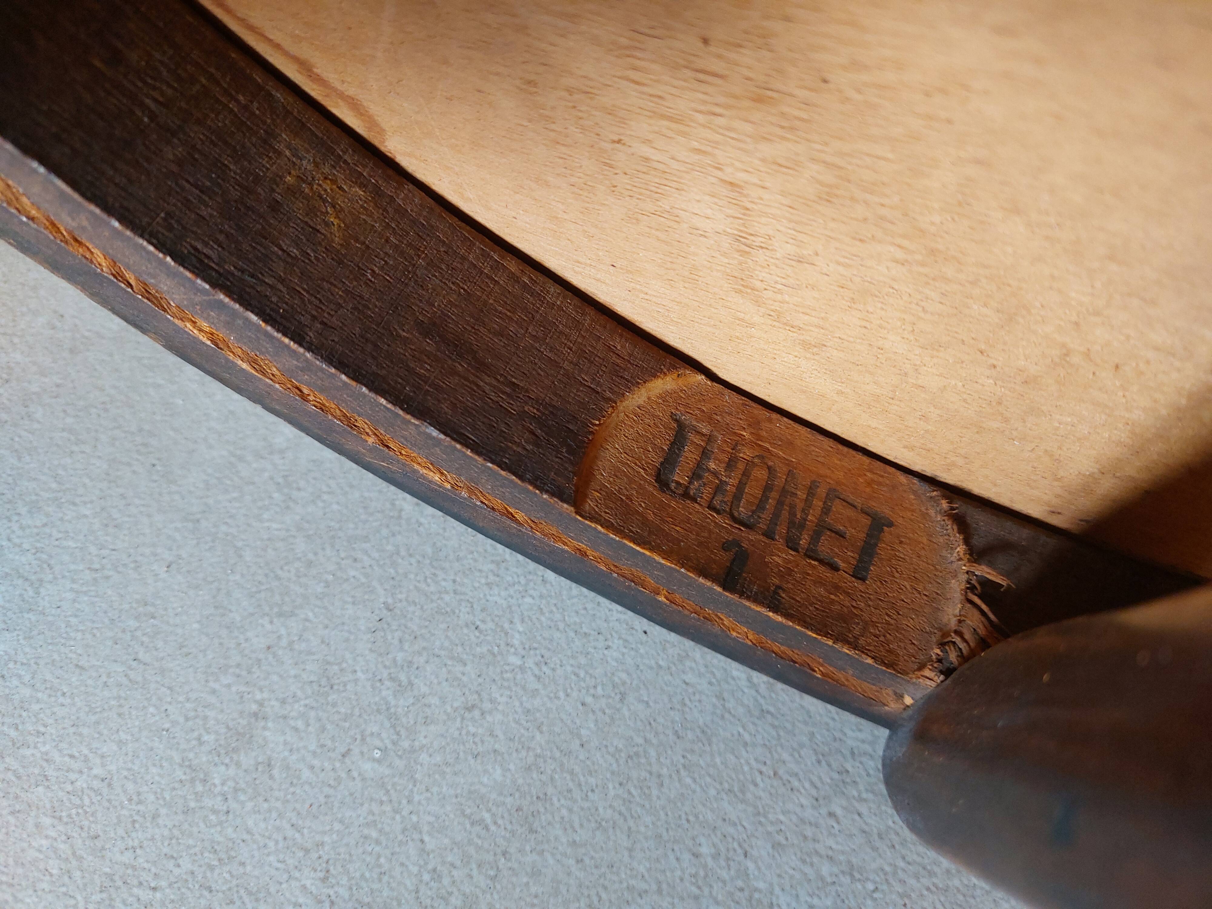 Thonet armchair, swivel, in wood and faux leather.