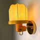 Pair of articulated "Cocoon" wall lights, resin and pine, Italy, 1970s