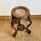 Carved wooden stool, red marble top, early 20th century