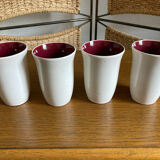 Set of four enameled stoneware glasses