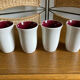 Set of four enameled stoneware glasses