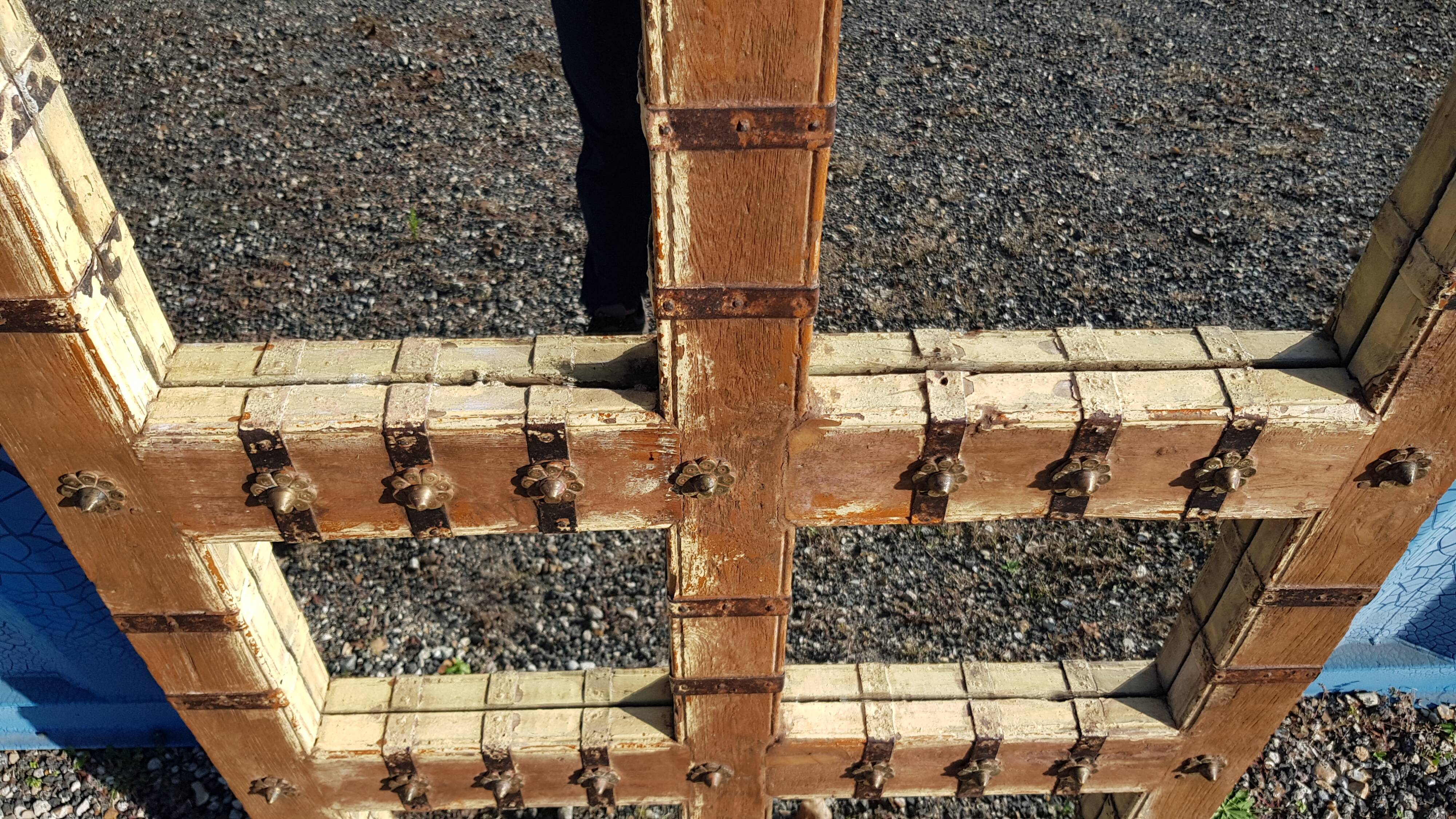 Old Burmese teak mirror with copper fittings