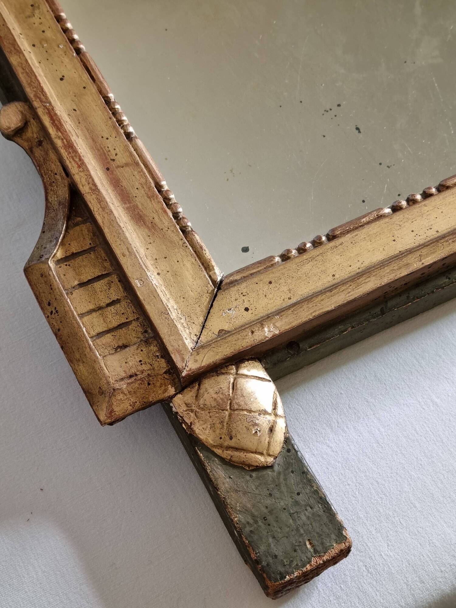 Antique carved and gilded wooden mirror, Louis XVI style – 54 x 92 cm