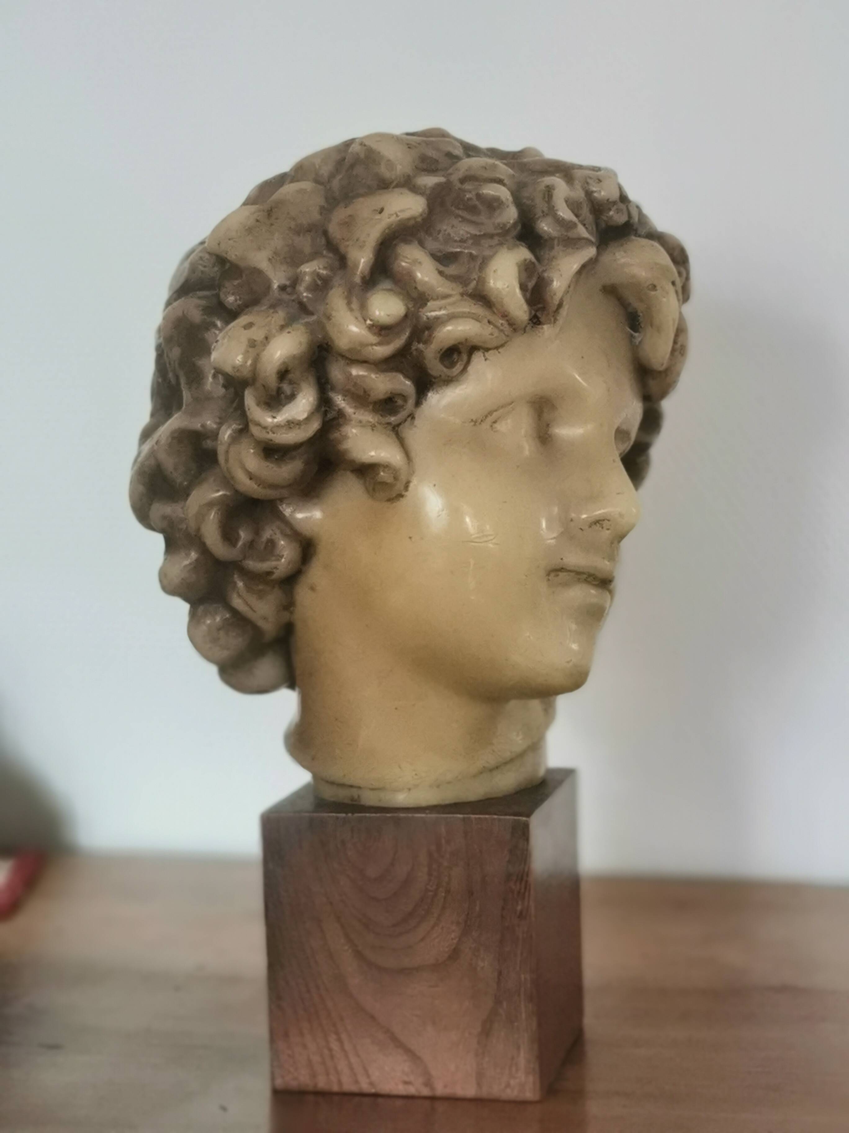 Wax head on “art deco” wooden base