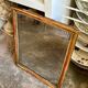 Wooden mirror with gilded stucco and beaded frieze, 45 x 37 cm