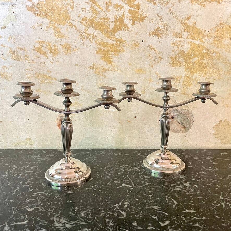 Pair of silver-plated metal art deco candlesticks
