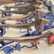 Lot de 11 porte couteaux chien teckel