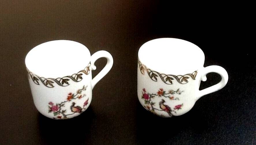 Two PL coffee cups (Limousine Porcelain) the crowned swallow