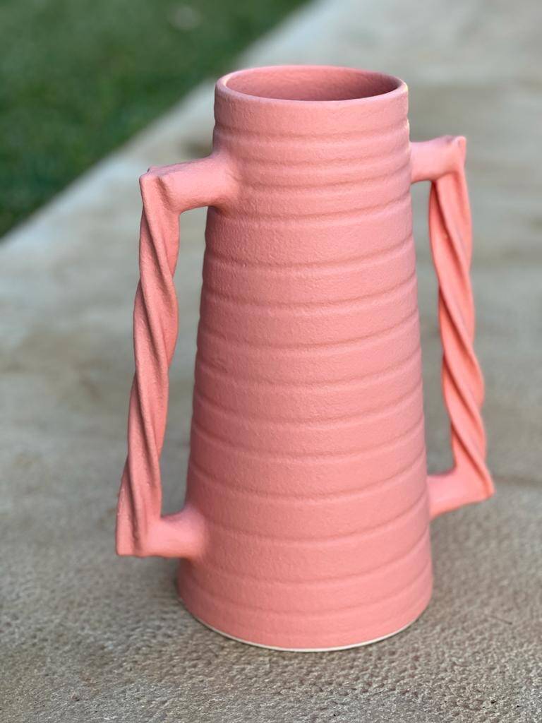 Ceramic vase with wavy handles