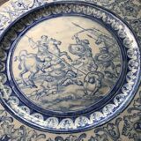 Antique glazed ceramic wall plate with battle scene decoration 41.5 cm