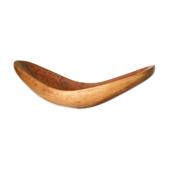 Brutalistic cut in exotic wood boomerang shape