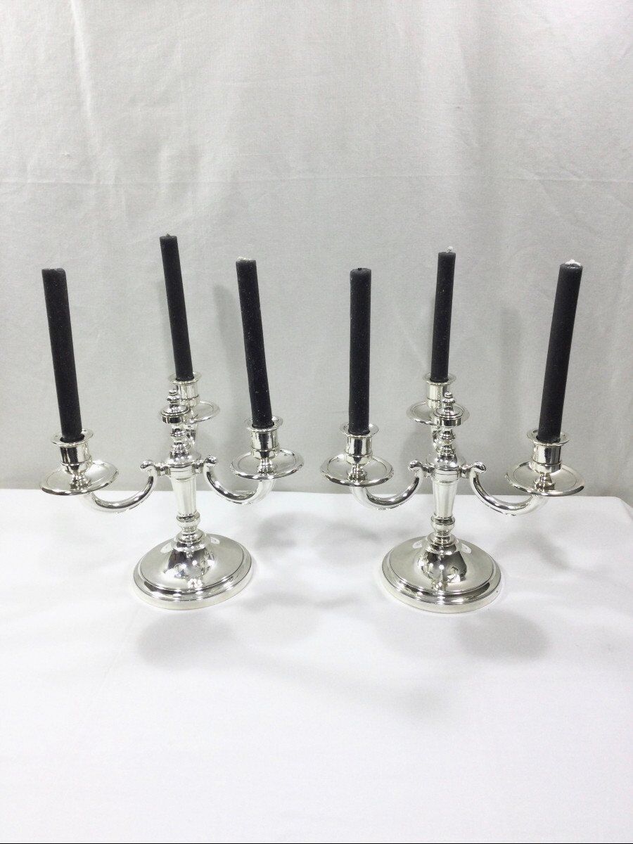 Pair of silver bronze candelabras
