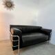 Old vintage leather and tubular metal sofa, design 70s