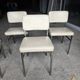 4 chrome metal chairs with faux leather from the 1970s.
