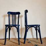 Duo of old blue bistro chairs