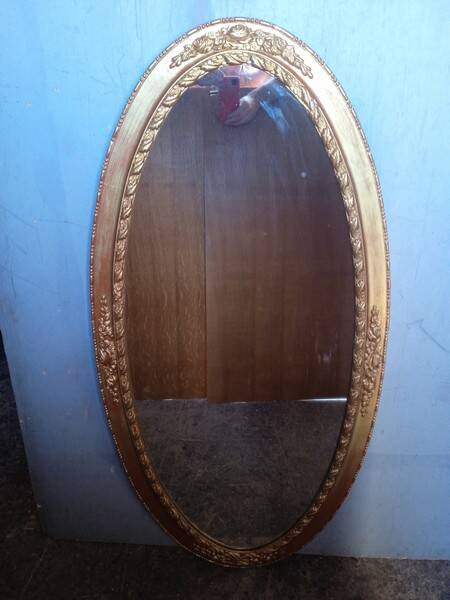 Oval mirror 134cm wood and gilded stucco early 20th century