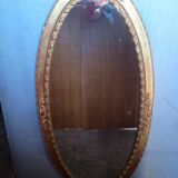 Oval mirror 134cm wood and gilded stucco early 20th century