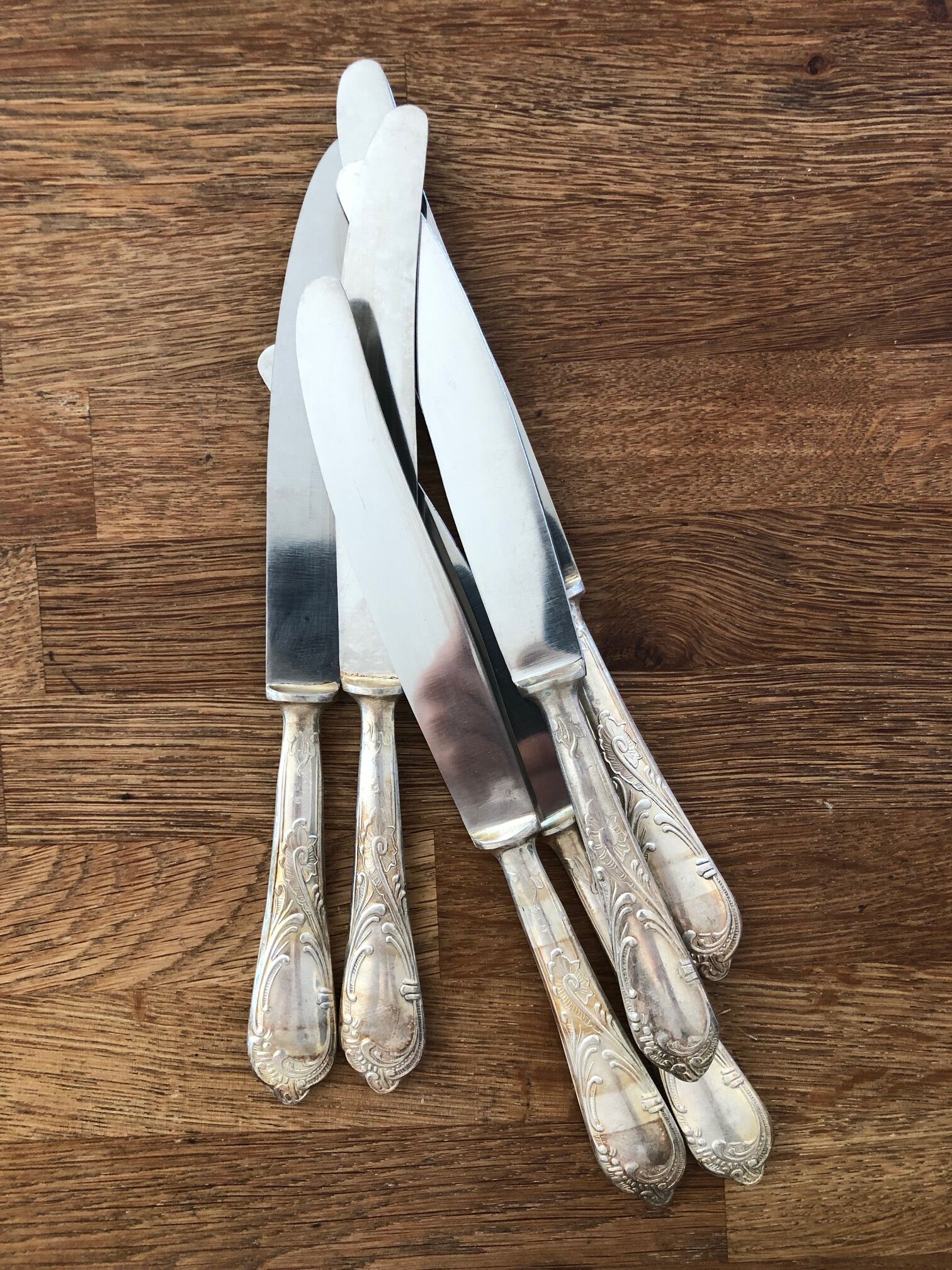 Series of 24 antique silver metal cutlery