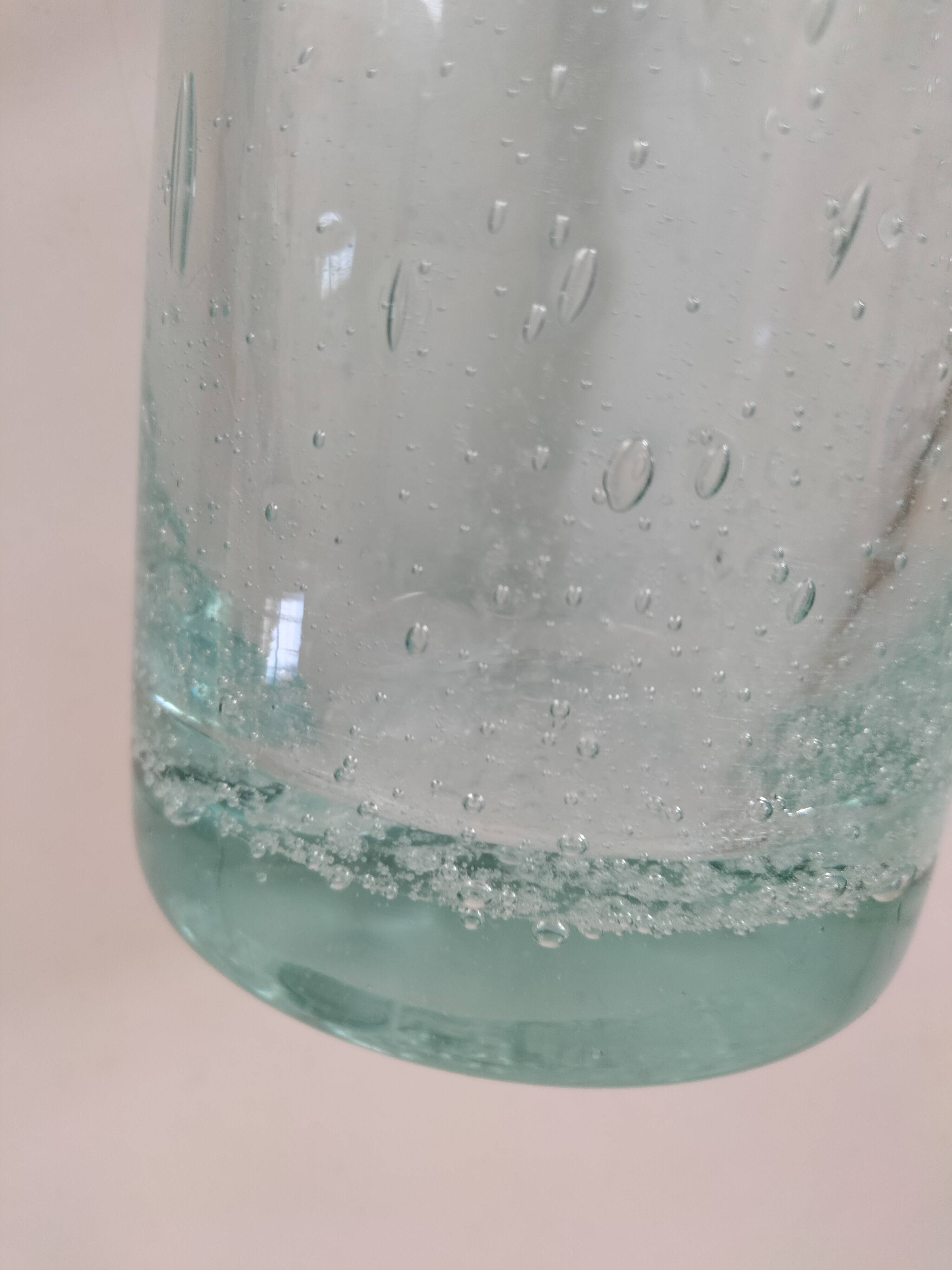 Vintage vase in very pale green bubbled glass, handcrafted