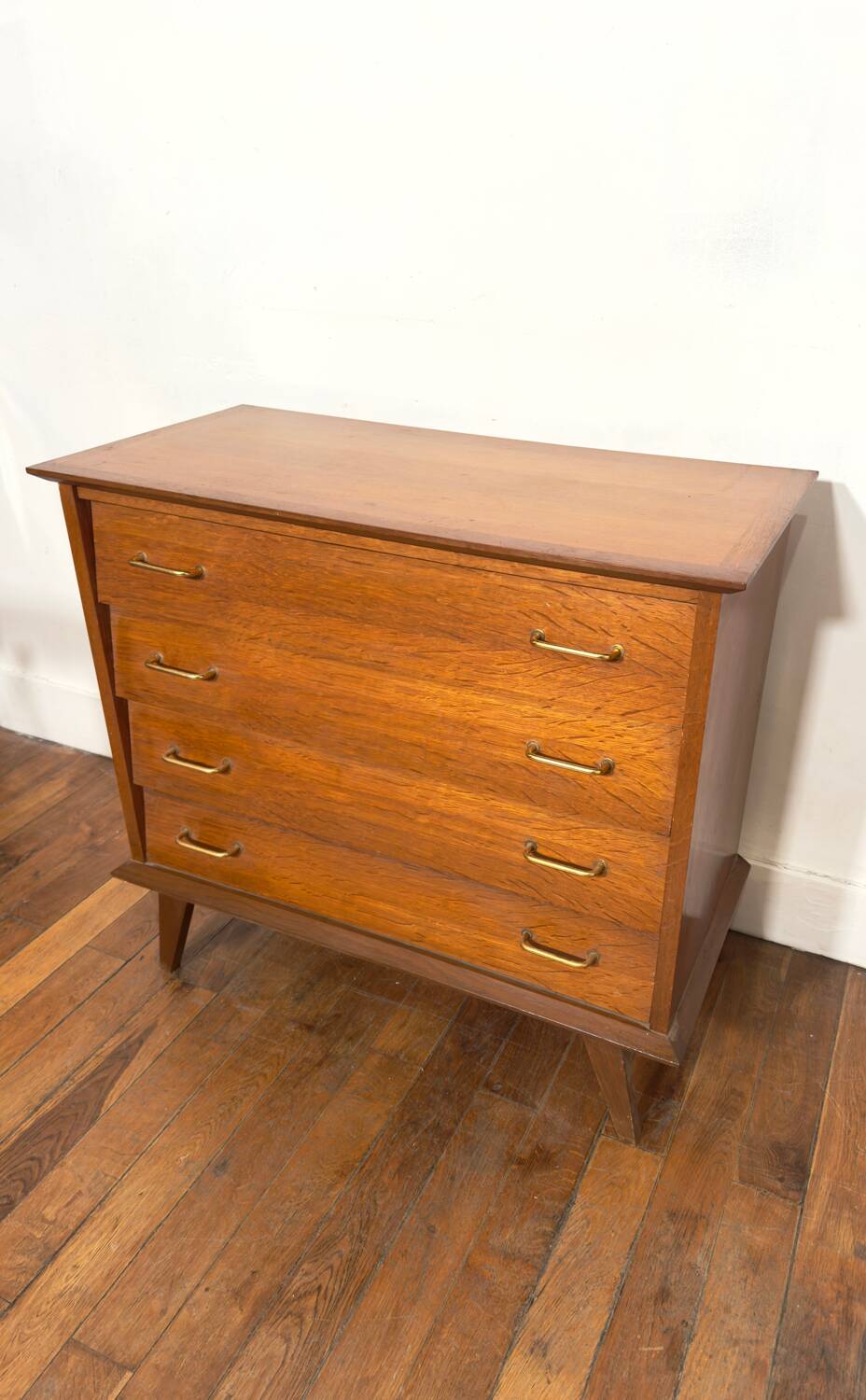 Chest of drawers with compass feet and gold handles