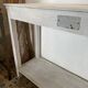 White patinated console
