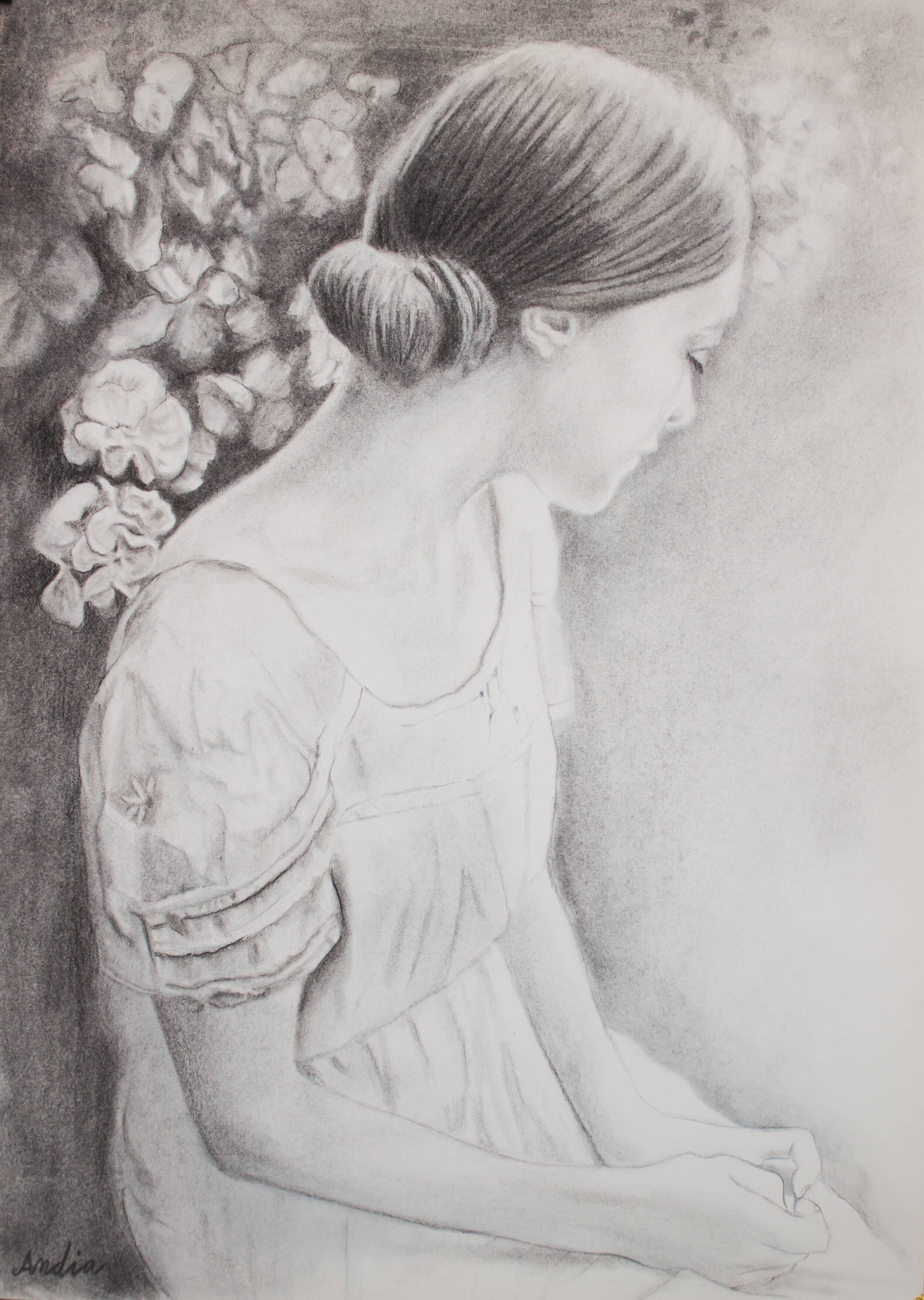 Charcoal drawing representing a young woman. Carbon paint.