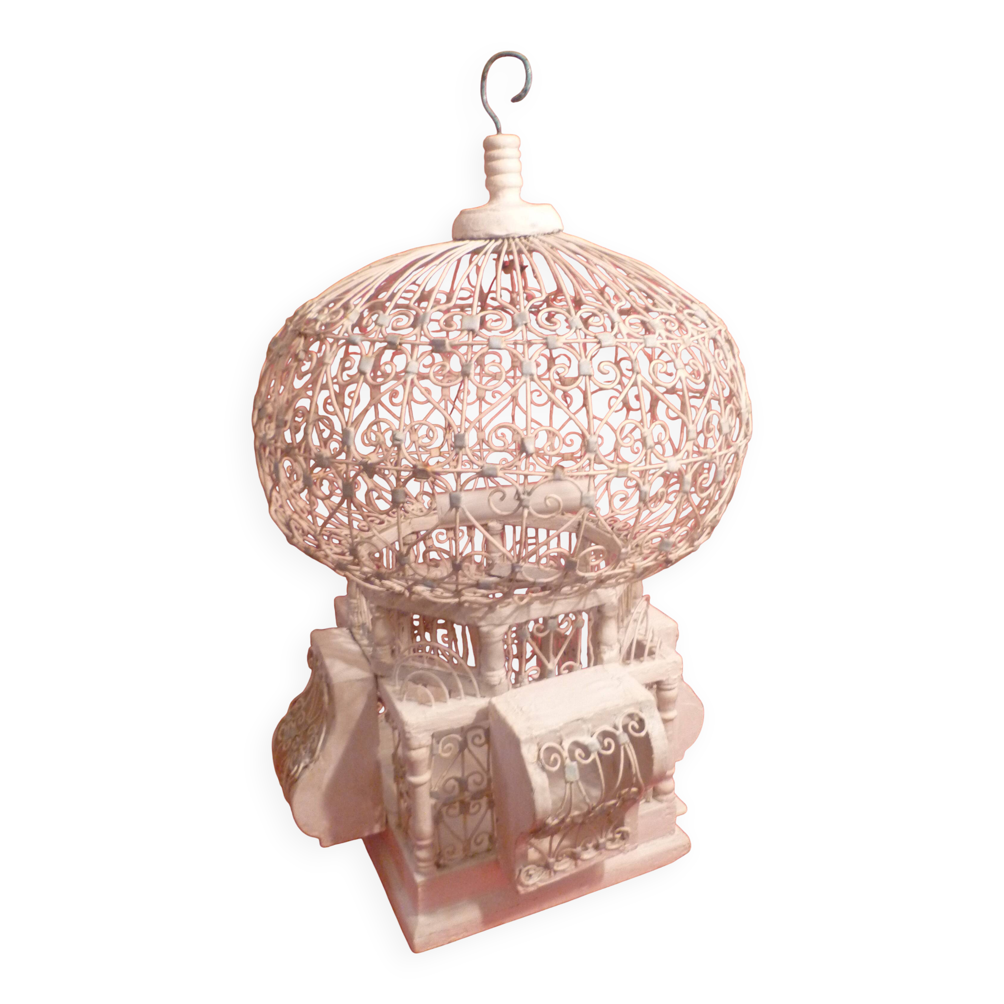 Antique handmade birdcage in metal and wood