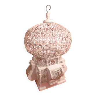 Antique handmade birdcage in metal and wood