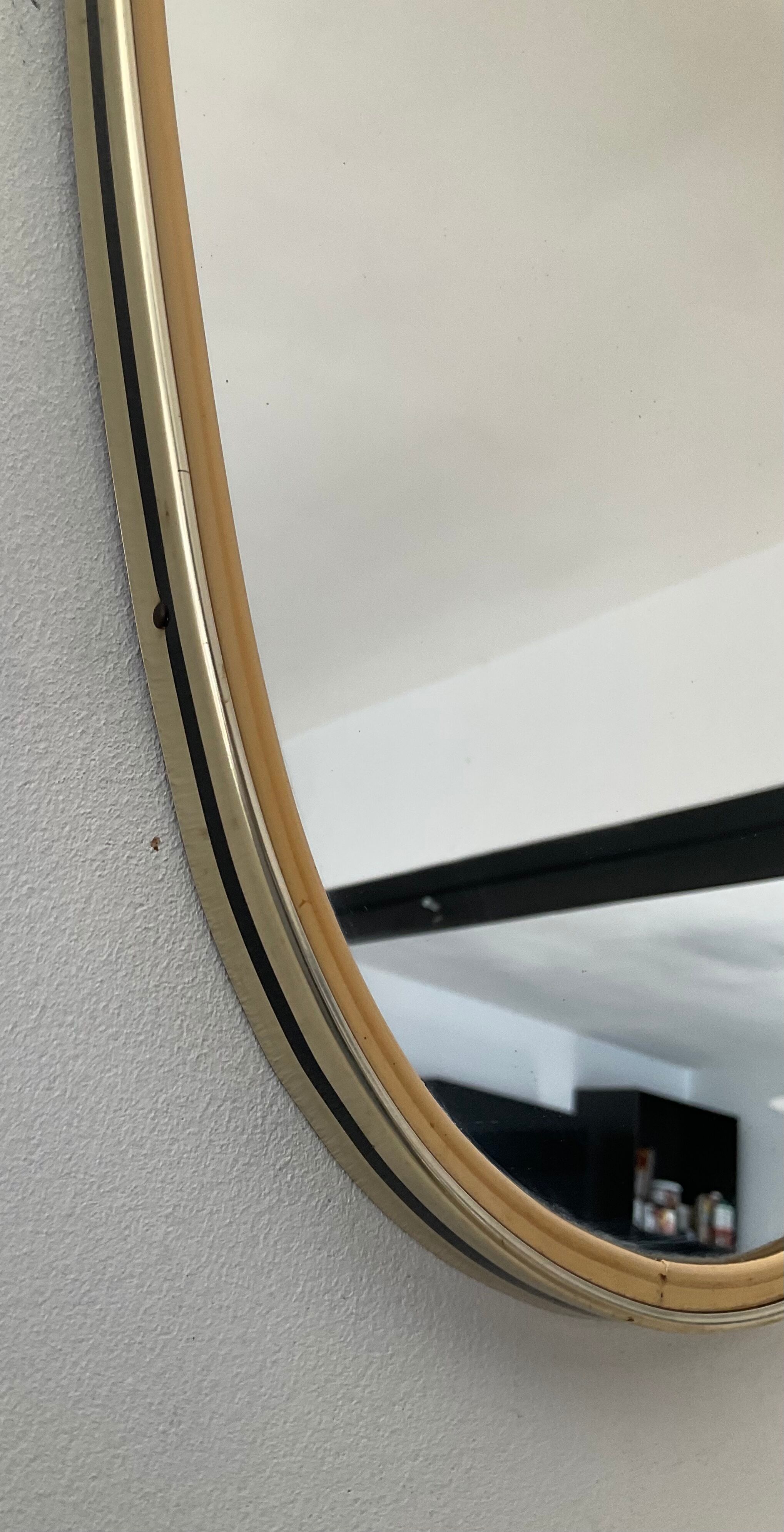 Free-form asymmetrical mirror from the 60s and 70s