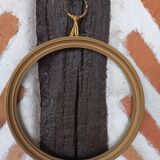 Round gilded glass frame