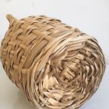 Old lady-jeanne dressed in vintage rattan