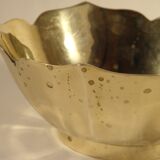 Two brass trundle cups