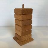 Six wooden egg cups and their Scandinavian style support