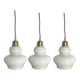 Lot de trois suspensions scandinaves en opaline blanche