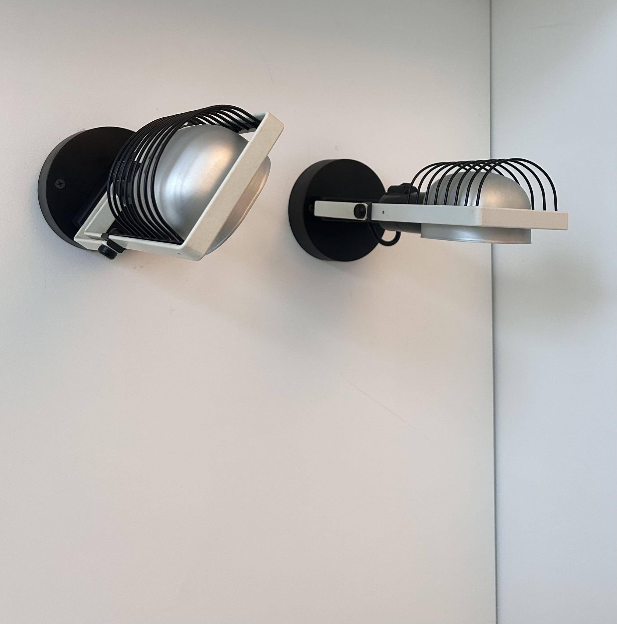 Pair of vintage Sintesi adjustable wall lights, by Gismonti for Artemide, Italy 1975