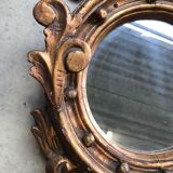 Miroir en bois doré Empire à décor d’aigle 40x97cm