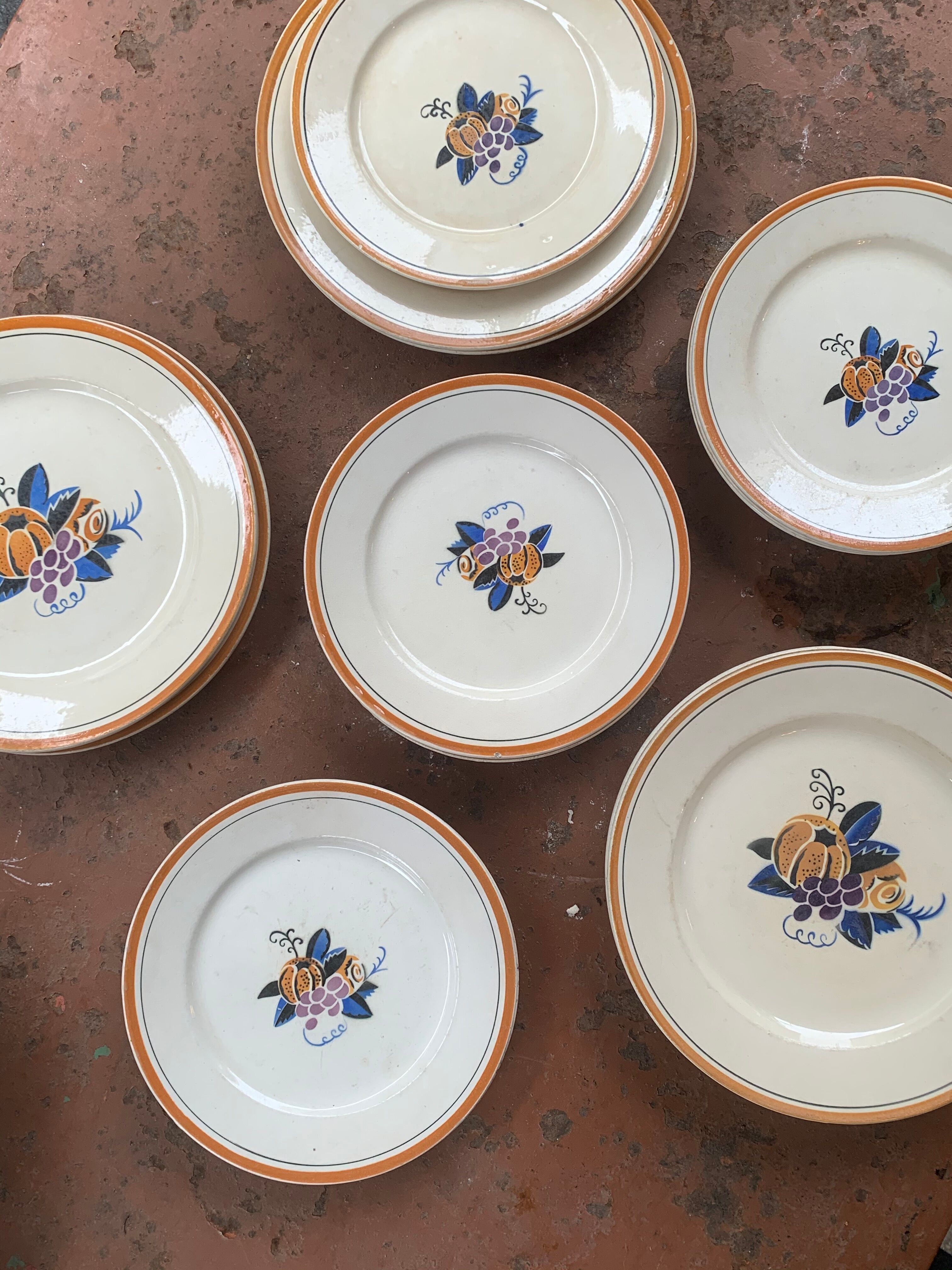15 orange Primavera plates