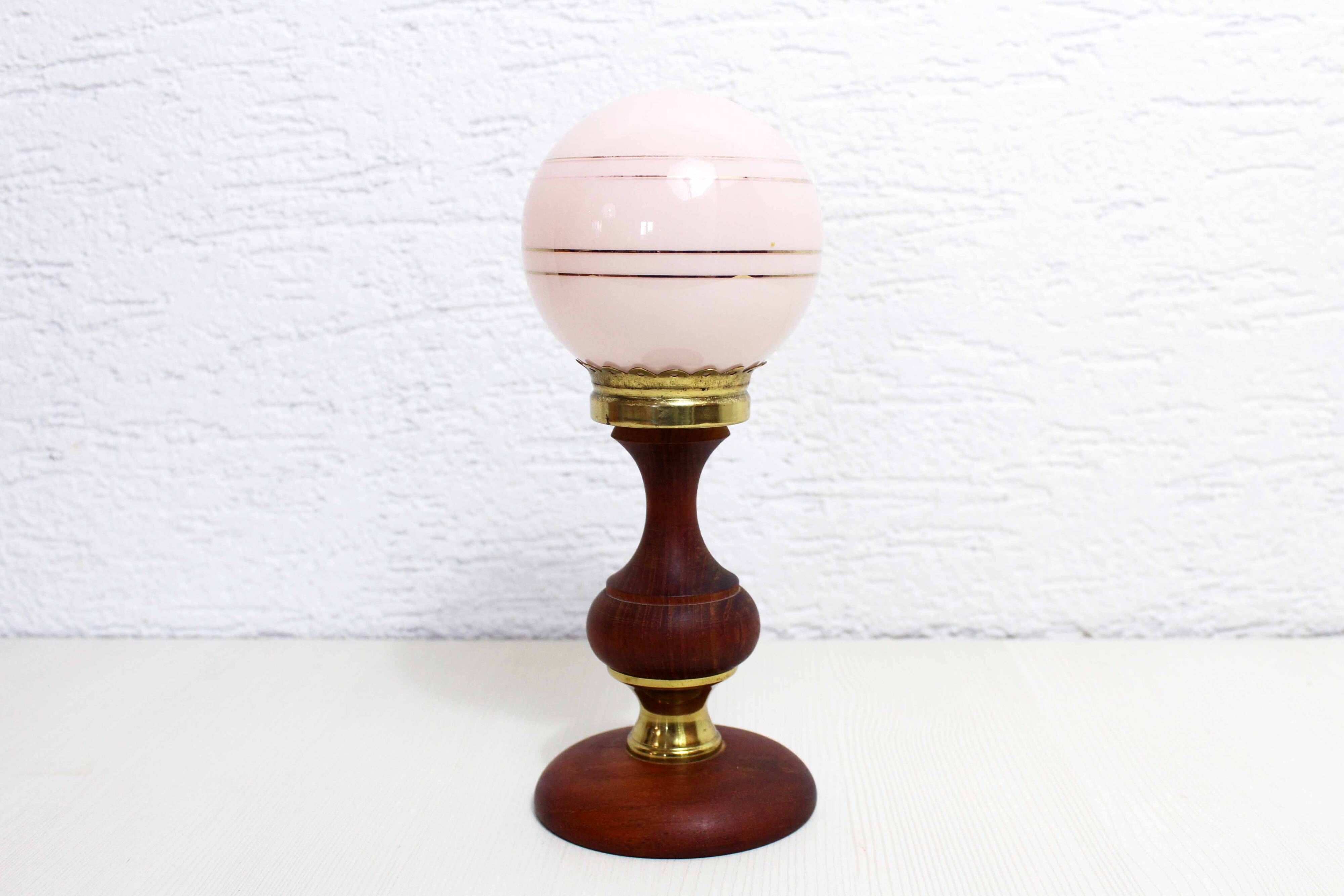 Table lamp in teak and pink glass