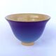 Blue glazed stoneware bowl on a foot, signed SP, Puisaye.