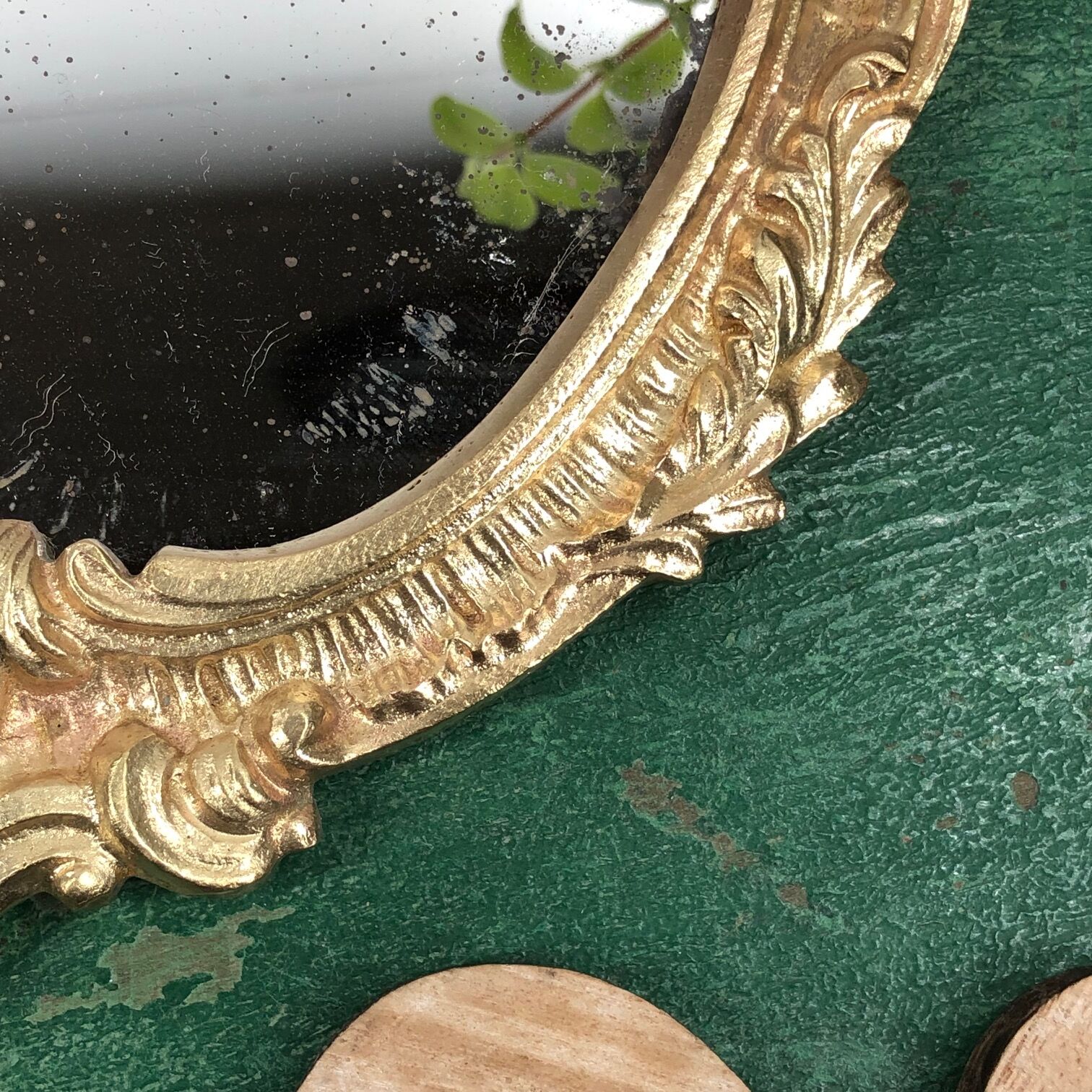 Bronze "face to hand" mirror