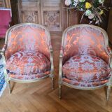 Pair of Louis XVI period shepherdesses, in gilded wood