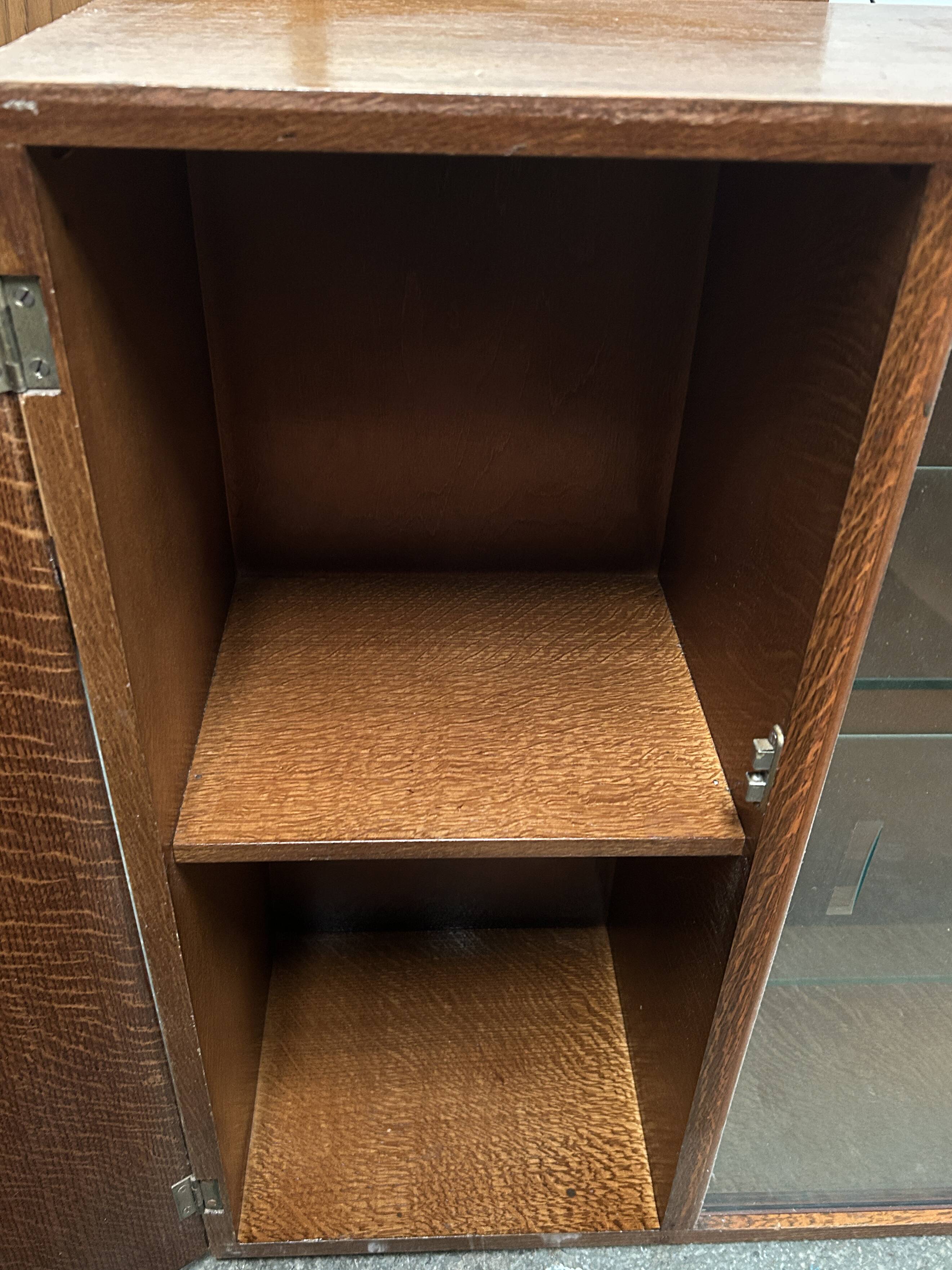 Mid Century vintage  bookcase with sliding glass doors by Turnidg