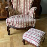 Louis Philippe style armchair with footrest from the 19th century.