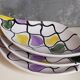 Three vintage free-form ceramic ravine dishes from the 1950s