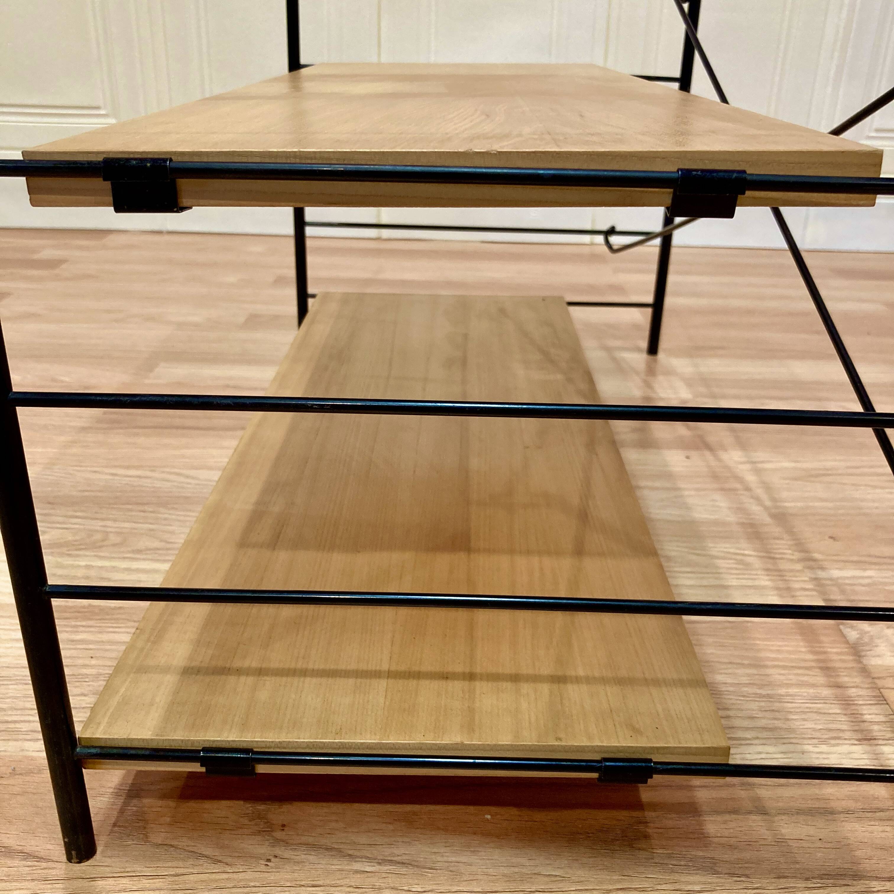 Modular metal and wood shelf design from the 1960s.