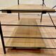 Modular metal and wood shelf design from the 1960s.